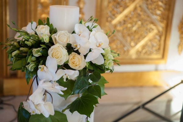 wedding church decoration with white roses and orchids