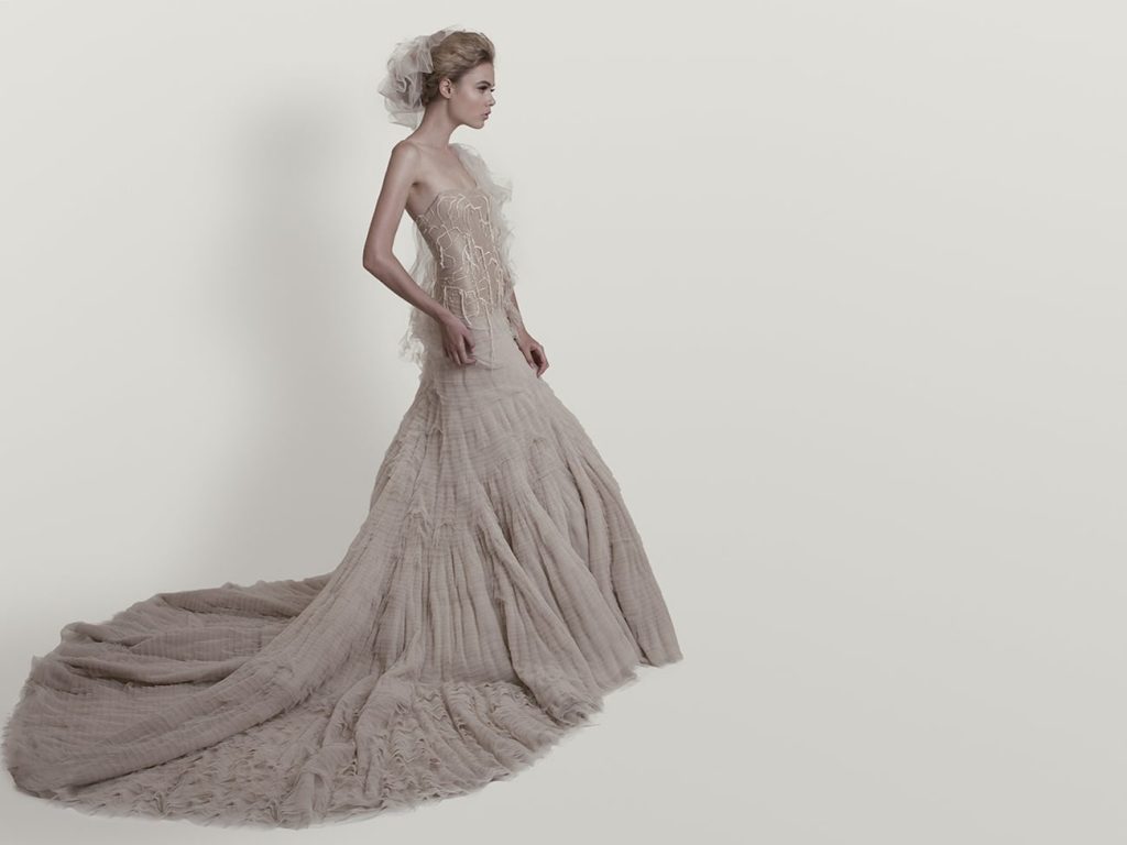 theatrical wedding dress with long train