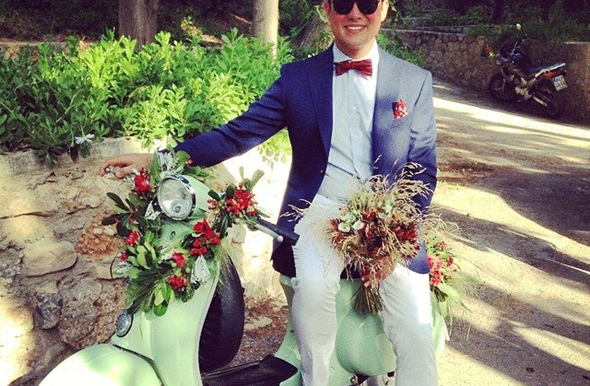 wedding vehicle decoration and groom with wedding bouquet