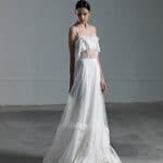 Romantic ethereal wedding dress with lace top with transparencies and thin straps