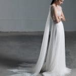Impressive romantic A line wedding dress with illusion lace bustier and tulle cape