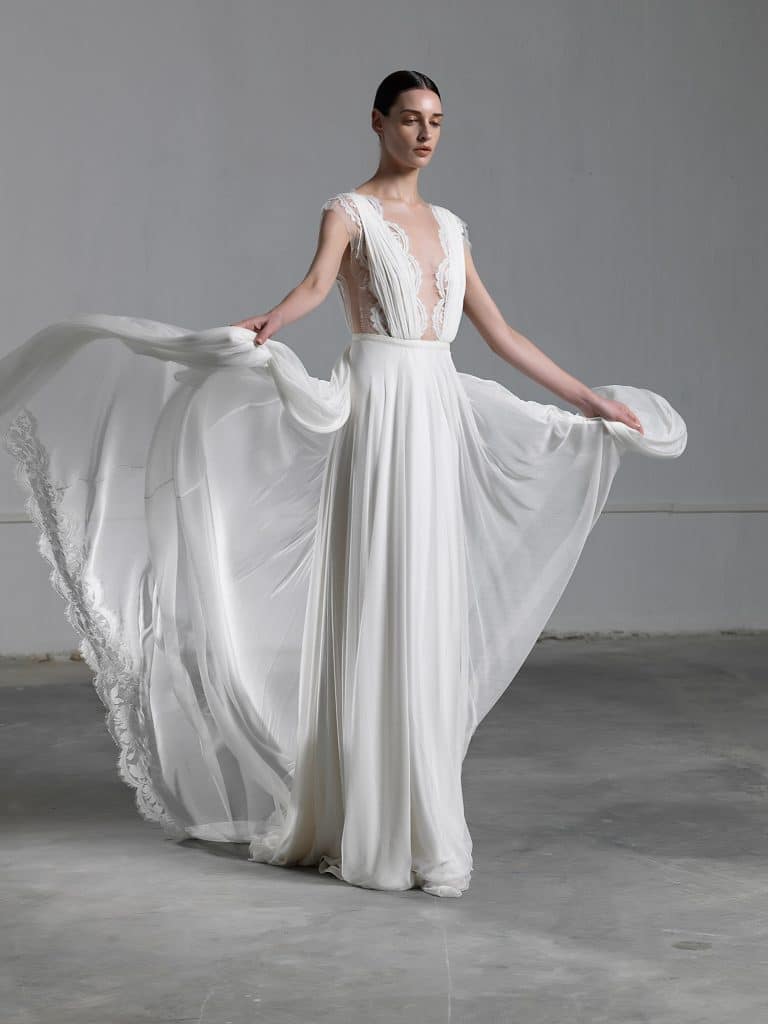 Romantic A line wedding dress with ethereal tulle skirt and lace top with low neckline