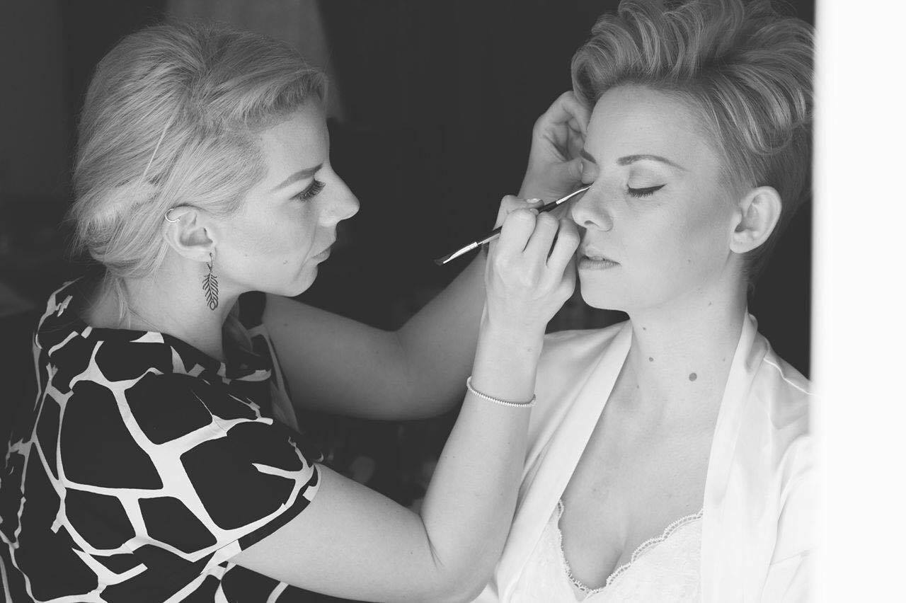 Bride getting ready with bridal make up