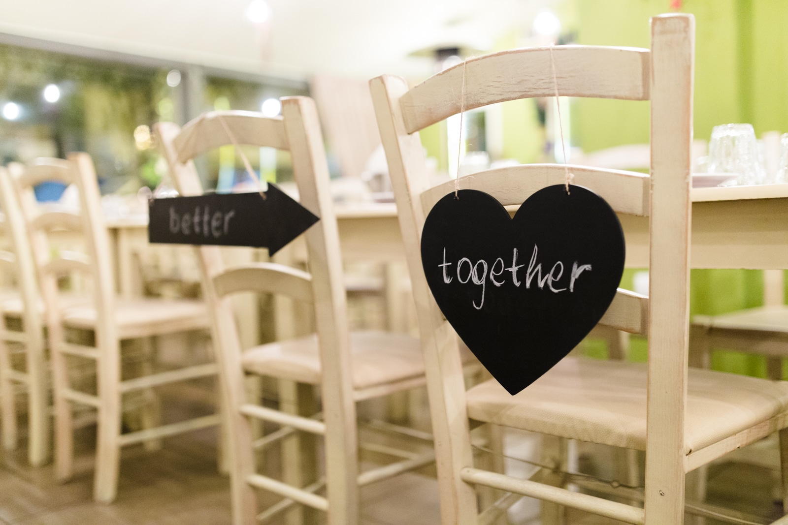 Black rustic chair signs for the bride and groom