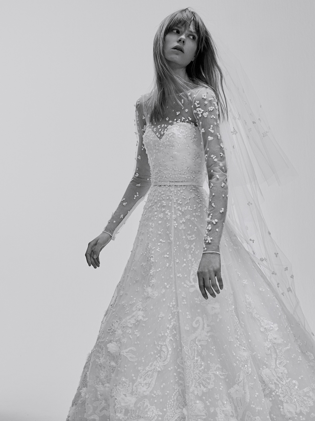 A line wedding dress with lace and transparencies