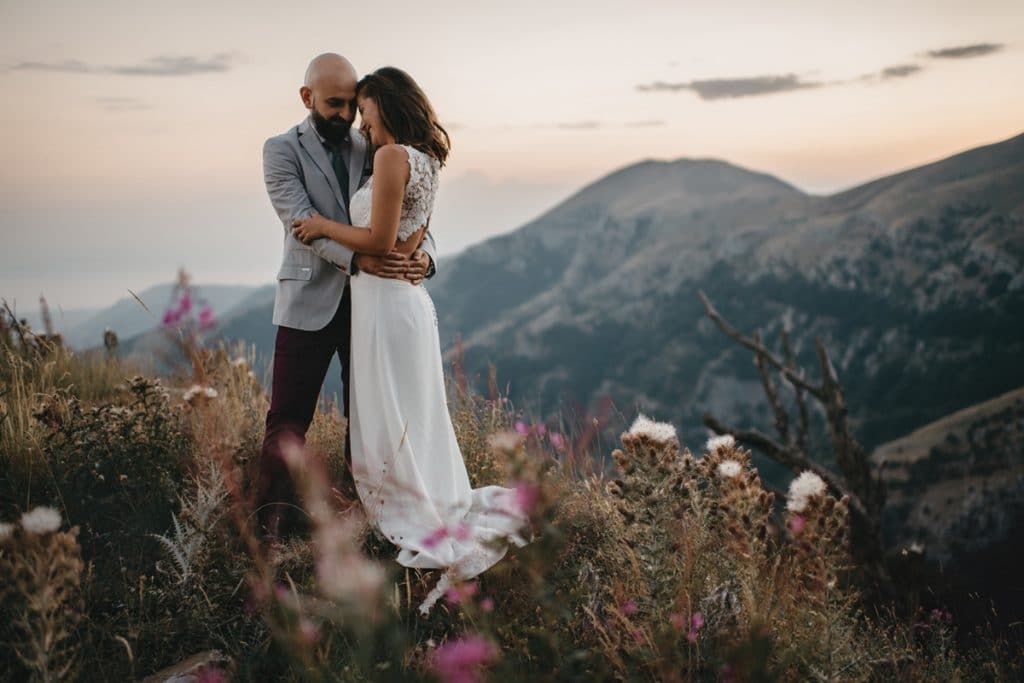 Bride and groom's photo shoot in the mountain Artographer