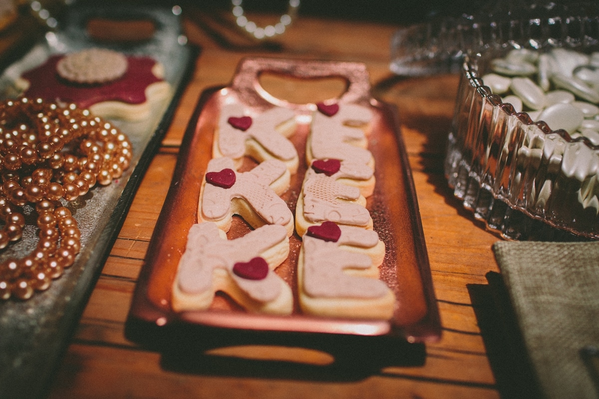 Pink wedding biscuits with the couple's monogram