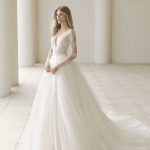 Ballgown wedding dress with tulle skirt long sleeves and low cut laced neckline Rosa Clara