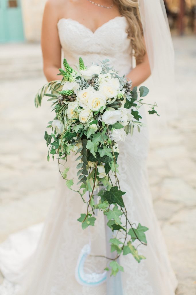 Bridal bouquet with white roses, olive leaves and ivy