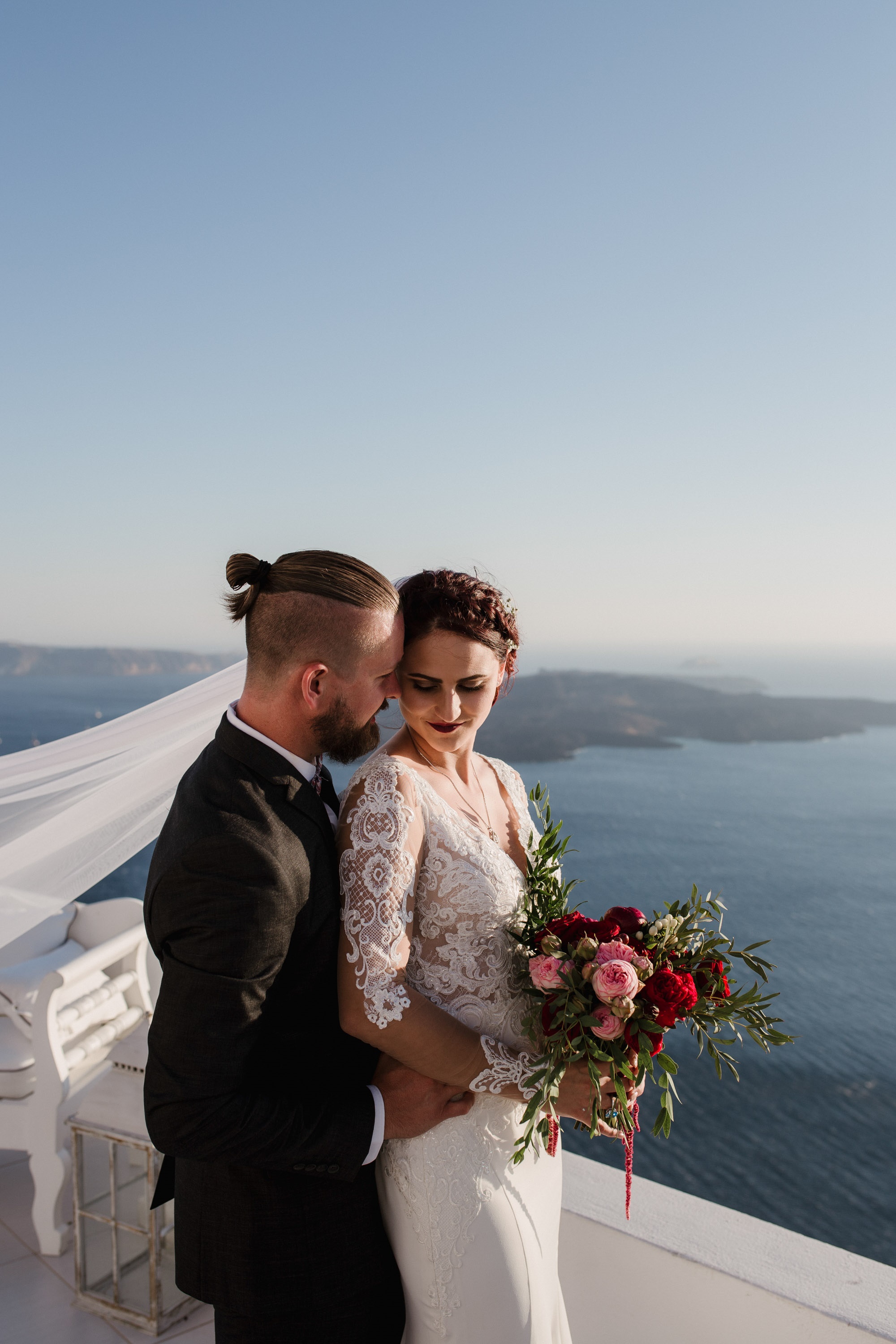 Wedding in Santorini with white and red shades