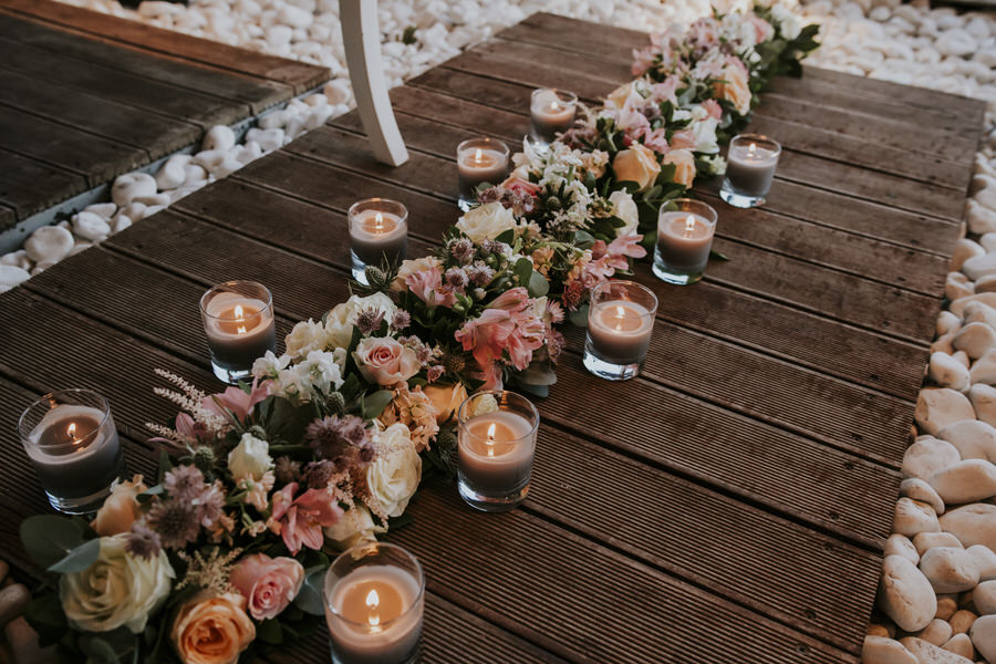 Rustic wedding with pink and golden shades